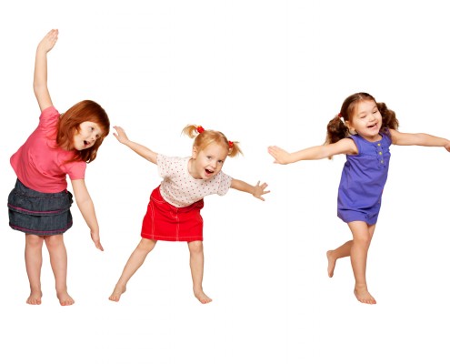Happy little children dancing. Joyful party.